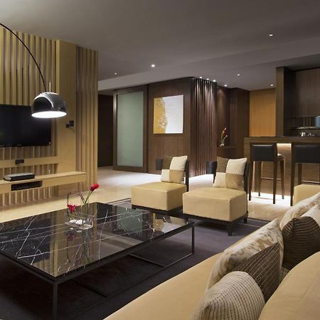 The Westin Mumbai Garden City Exterior photo The living room of a suite at The Ritz-Carlton, Hong Kong