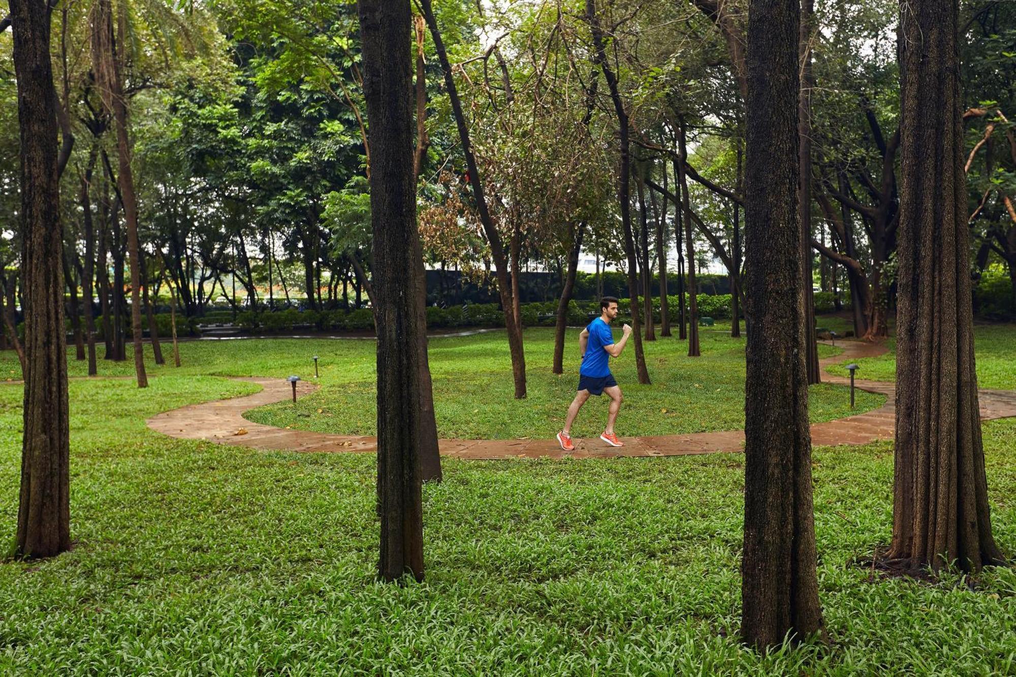 The Westin Mumbai Garden City Exterior photo Jogger in the park